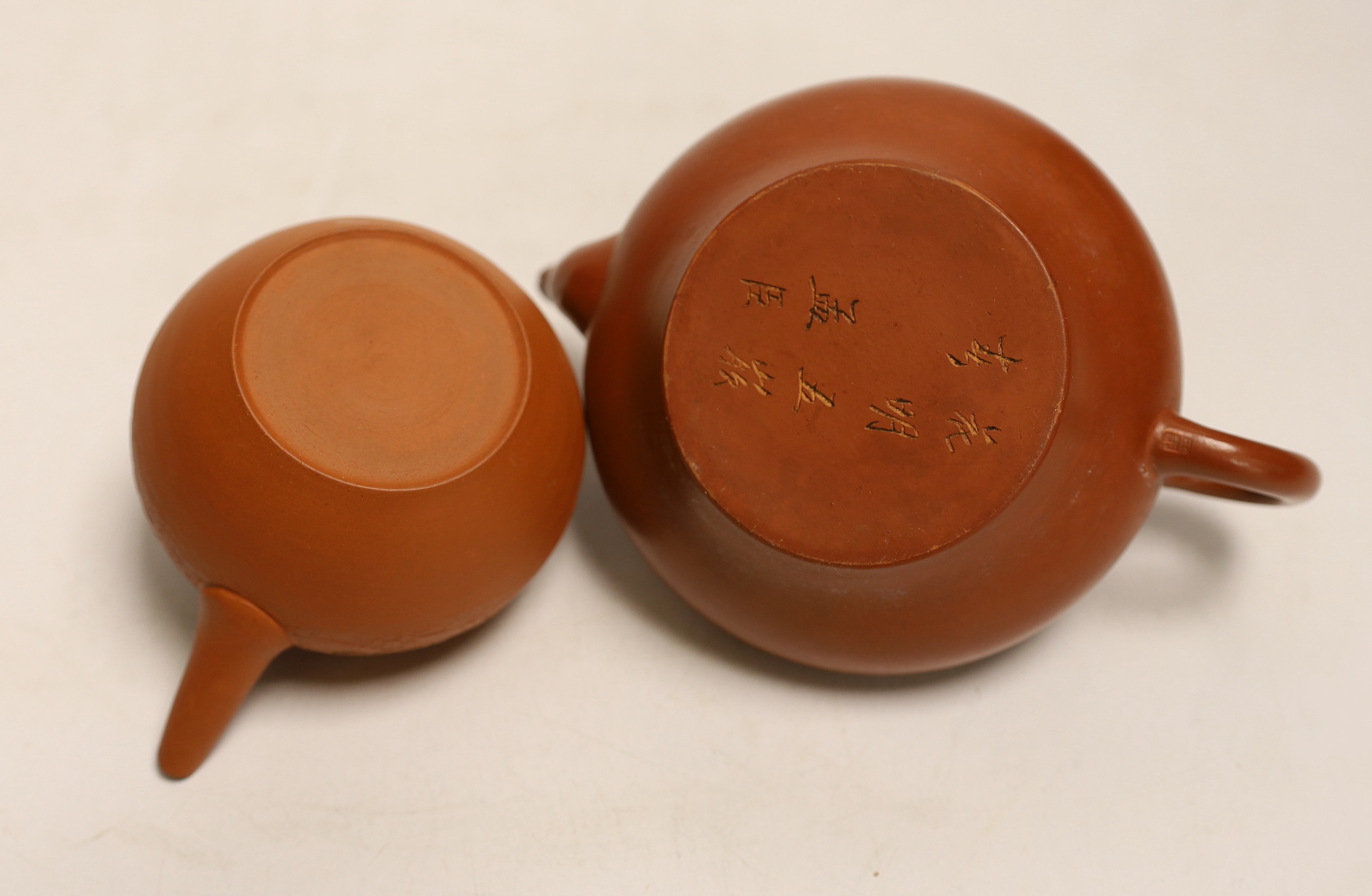 Four Chinese Yixing terracotta teapots, largest 10cm